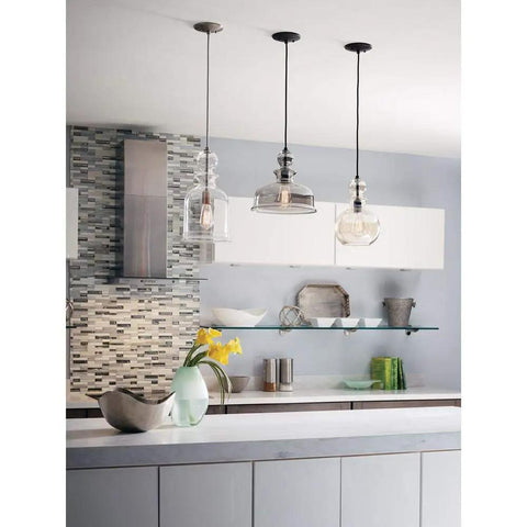 Modern kitchen with Dope Antique Bronze Champagne Glass Pendant Light With Vintage Woven Cloth Cord, Parisian Boutique Inspired Chess Piece Silhouette hanging.