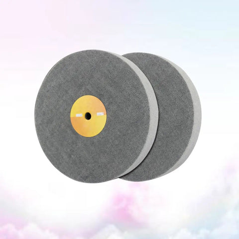 Two gray buffing pads from Nylon Fiber Polishing Wheel With Buffing Pad And Grinding Discs 5 Pack For Metal And Wood Polishing