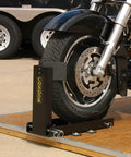 Trailer-Only Bike Chock With Fold-Down Design And Patented Lock For Upright Parking, Snap-On On/Off Transport Platform Mount, All-Steel SC-2000 For Rock-Solid Bike Stow On Trailers holding motorcycle tire on trailer