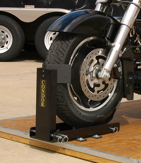 Trailer-Only Bike Chock With Fold-Down Design And Patented Lock For Upright Parking, Snap-On On/Off Transport Platform Mount, All-Steel SC-2000 For Rock-Solid Bike Stow On Trailers holding motorcycle tire on trailer