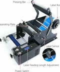 No Sweat Manual Labeling Machine And Label Applicator for Round Glass Plastic Bottles showing pressing bar, gears, and sensors.