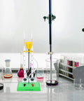 Water Electrolysis Experiment Kit For Home School Hands On Lab Demonstration Of Hydrogen And Oxygen Production With Durable Plastic Electrolyzer Apparatus on lab table.