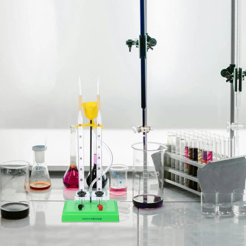 Water Electrolysis Experiment Kit For Home School Hands On Lab Demonstration Of Hydrogen And Oxygen Production With Durable Plastic Electrolyzer Apparatus on lab table.
