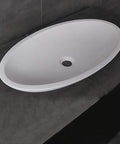 Top Shelf White Oval Vessel Vanity Sink Solid Artificial Stone Above Counter Bowl Basin Built Tough Scuff Resistant Finish top view on countertop.