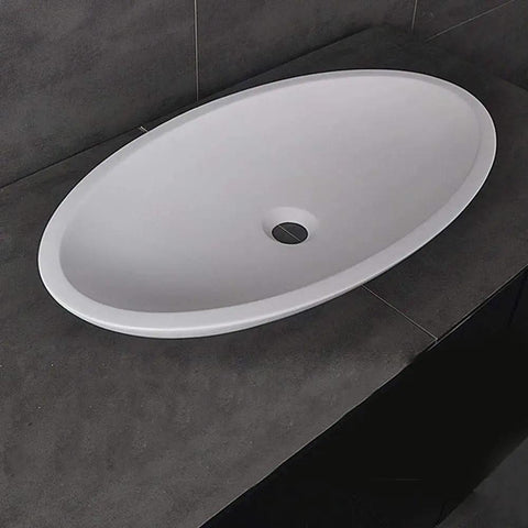 Top Shelf White Oval Vessel Vanity Sink Solid Artificial Stone Above Counter Bowl Basin Built Tough Scuff Resistant Finish top view on countertop.