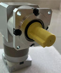 Heavy Duty Slick 90mm Planetary Speed Reducer Gearbox With 40 To 1 Ratio close-up view showcasing yellow output shaft and aluminum housing.