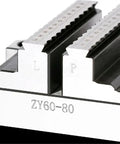 Heavy Duty Workhorse Turntable Fixture Featuring Self Centering Concentric Vise And Precision Machining Clamps, close-up of jaws.