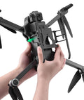 Hands attaching Height Extender Landing Gear Kit With Quick Release For Ruko F11 Pro GIM2 GIM Contixo F24 Pro F35 Sjrc F11S Deerc De22