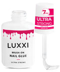 Brush On Nail Glue For Press On Nails With Precision Applicator Pink Gel Adhesive For Artificial And Acrylic Tips Quick Air Dry Long Wear Hold No UV Lamp Needed Ideal For DIY Mani Lovers 0.24oz. visible with open cap and brush.