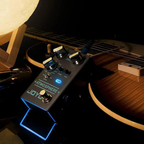 Digital Reverb Guitar Pedal With Nine Modes Including Spring Church Plate Shimmer And More MOD Control And Trail Bypass Atmosphere R14 For Rich Studio Ready Vibe On Any Rig with guitar and lamp