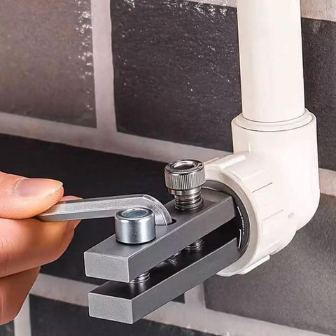 Multifunction Broken Pipe Extractor Set for Damaged Bolts Faucets and Stripped Threads in use on a pipe fitting with hex wrench