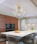 Glam Gold 13 Bulb LED Pendant Light Chandelier With Crystal Flower Shade in modern kitchen setting.