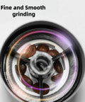 View of ceramic burr grinding coffee beans in Portable Manual Coffee Grinder With Ceramic Burr, Adjustable Settings And Detachable Hand Crank For Travel, Camping, Office Or Home Use, Grind Fresh Espresso Or Pour Over On The Go.