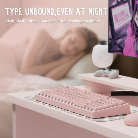 Premium Wireless Mechanical Keyboard With Hot Swap Gasket Mount, Lowkey Gorgeous Pink Shell, Effortless Bluetooth Connection, Vibrant RGB Lighting, Straight Upgrade For Modern Workspaces on a desk with a sleeping person in the background.