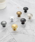 Oil Rubbed Bronze Round Cabinet Knobs One And A Quarter Inch Ten Pack Solid Metal Drawer Pulls For Kitchen Cabinets Dressers Cupboards Bedrooms And Bathrooms Remodel Up Your Space With A Clean Modern Look displayed with multi-color variations on a marble surface