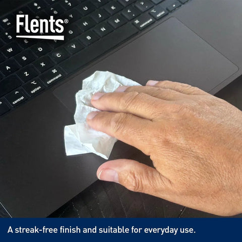 Flents Lens Wipes - close-up of hand wiping a laptop with a white pre-moistened wipe