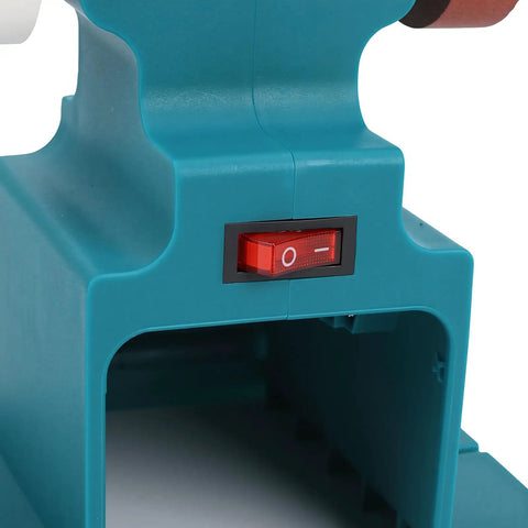 Close-up of the power switch on the Cordless Mini Bench Grinding Machine With Dual Wheels For Metal Sharpening And Polishing.