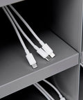 Secure 24 Door Clear View Cell Phone Charging Locker With Usb C Micro Lightning Ports For Offices Classrooms showing white charging cables.