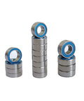 16 Pack RC Rubber Sealed Ball Bearings Kit For 1/10 TT02 RC Cars Chromium Steel 52100 in three stacks of varying sizes