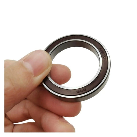 Heavy Duty Motor Bearing Swap For T40 T50 T20P Drones, sealed steel bearing held in hand ready for installation.