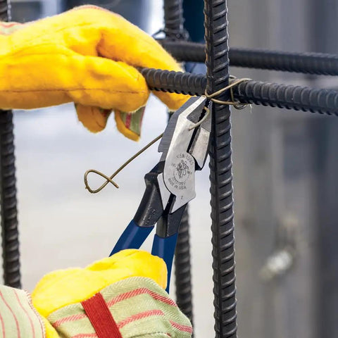 High Leverage Ironworker's Pliers For Twist And Cut Soft Annealed Tie Wire With Hook Bend Handle in use on rebar