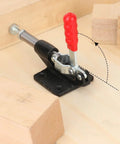 Metal clamp part of 4 Pack GH 305C Push Pull Toggle Clamp Kit With Quick Release Stroke And 500 Lbs Holding Power For Welding, Woodworking, Metalworking And More, Beefy Durable Heavy Duty Build For Jigs, Fixtures, Assembly And Fabrication Tasks mounted on wooden surface.