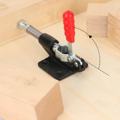 Metal clamp part of 4 Pack GH 305C Push Pull Toggle Clamp Kit With Quick Release Stroke And 500 Lbs Holding Power For Welding, Woodworking, Metalworking And More, Beefy Durable Heavy Duty Build For Jigs, Fixtures, Assembly And Fabrication Tasks mounted on wooden surface.