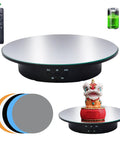 Electric Motorized Rotating Display Stand With Remote Control, 360 Degree Turntable For Photography Products Jewelry And Collectibles, 7.8 Inch Platform with a mirrored surface and colorful backgrounds.
