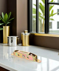 Heavy Duty Double Wheel Sliding Door Pulley Set Metal Roller Track Assembly on marble surface near plants and decor.