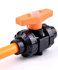 Built Tough Heavy Duty Pvc Ball Valve With Double Union Connector And Rock Solid Check Valve Delivers Slick Swivel Control For Nifty 75 To 110 Mm Garden Hose Line Jobs, black and orange valve, 75-110 mm size.
