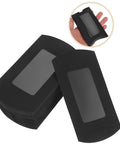 50 Pack Black Kraft Paper Pillow Gift Boxes With Window For Birthday Parties And Events, shown in hand for size reference