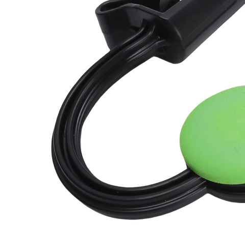 Close-up of the Golf Swing Trainer With Instant Tactile Feedback And Swing Analyzer for Beginners showing green grip pad and black cables.