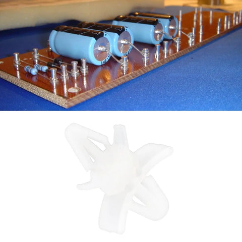 Top Shelf 100 Count White Pcb Standoff Mounting Clips Quick Snap Fit For 4Mm Holes, shown with PCB and capacitors.