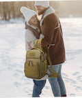 High Capacity Outdoor Camping Backpack With Wolf Camouflage For Hiking And Fishing Tackle Storage near couple in snow
