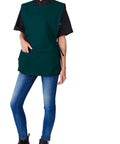 Rugged Cobbler Apron With Two Deep Pockets Cut From Smooth Poly Cotton Twill Featuring Adjustable Side Ties, worn by a model.