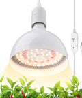 Next Level Heavy Duty Hanging Grow Light Bulbs For Indoor Plants 25W Full Spectrum illuminating green plants with a plug-in timer.