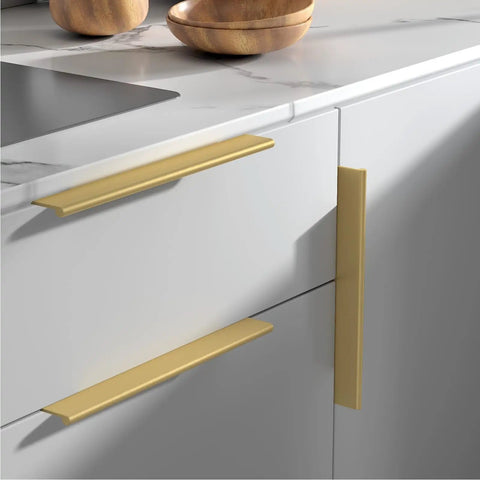 Straight Up Durable Gold Cabinet Drawer Pulls For Kitchens And Dressers, Rock Solid Aluminum Finger Grips With Smooth As Butter Glide, Hidden Edge Handle In 20 Pack With Mounting Screws Included displayed on modern kitchen cabinetry.