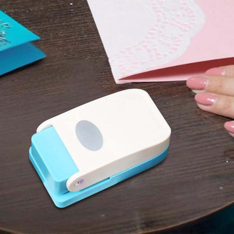 Dope Tiny Paper Punch Hole Puncher For Scrapbooking And Photo Albums, Oval Shape, Acrylic And Metal Cutter on a table with hands