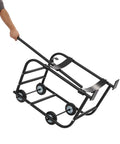 Heavy Duty Steel Drum Cradle Cart With Smooth Rolling Casters And Retractable Dump Bar For 600 Lb 55 Gallon Drums being pulled by hand.
