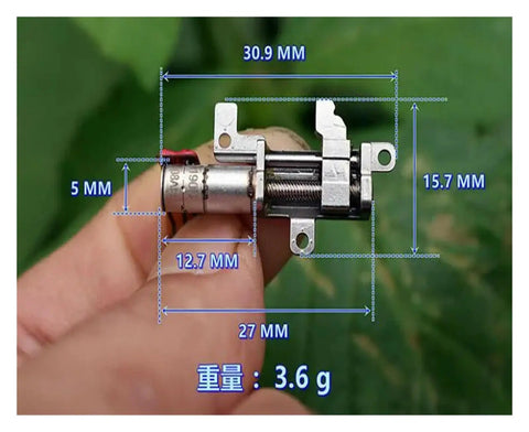 Close-up of 5mm Gearbox Stepper Motor, 8mm Stroke Linear Actuator, held by a hand with dimensions highlighted