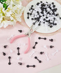 Secure Your Gear Hella Smooth With 300 Black White Tag Fasteners Plastic Flat Round Security Ties on a pink surface with flowers.