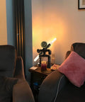 Robot Pipe Table Lamp With Rustic Industrial Style Two Light Edison Bulb Desk Light in cozy living room.