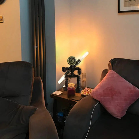 Robot Pipe Table Lamp With Rustic Industrial Style Two Light Edison Bulb Desk Light in cozy living room.