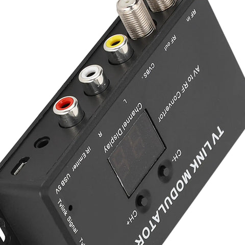 Top view of Compact AV to RF Modulator with adjustable audio level, showing connector ports for DIY cable setups and home theater.