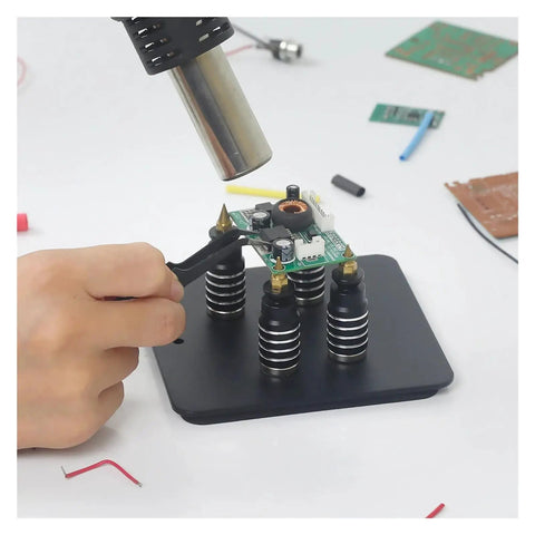 Person using Pro Grade Magnetic Soldering Station With Flexible Third Hand Bracket for electronics repair