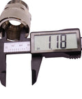 1-inch NPT fuel swivel connector being measured with caliper
