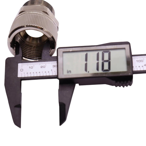 1-inch NPT fuel swivel connector being measured with caliper