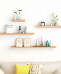 Wall shelves mounted with size eight drywall and concrete anchors kit, displaying decor items, showcasing application.