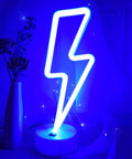 Lit Lightning Bolt Neon Sign With Base USB And Battery Powered Blue LED Light For Bedroom Decor Perfect Gift For Teens Boys And Girls Dope Gaming Mood Light With Holder glowing on a table.
