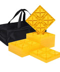 Ten Pack RV Camper Leveling Blocks With Interlocking Design Non Slip Pads Durable Carrying Bag And Levelers For Travel Trailer Use On Gravel Grass And Uneven Surfaces Yellow, showing blocks stacked beside carrying bag